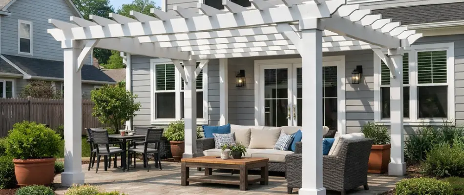 Couch under a white pergola in Cary, NC.